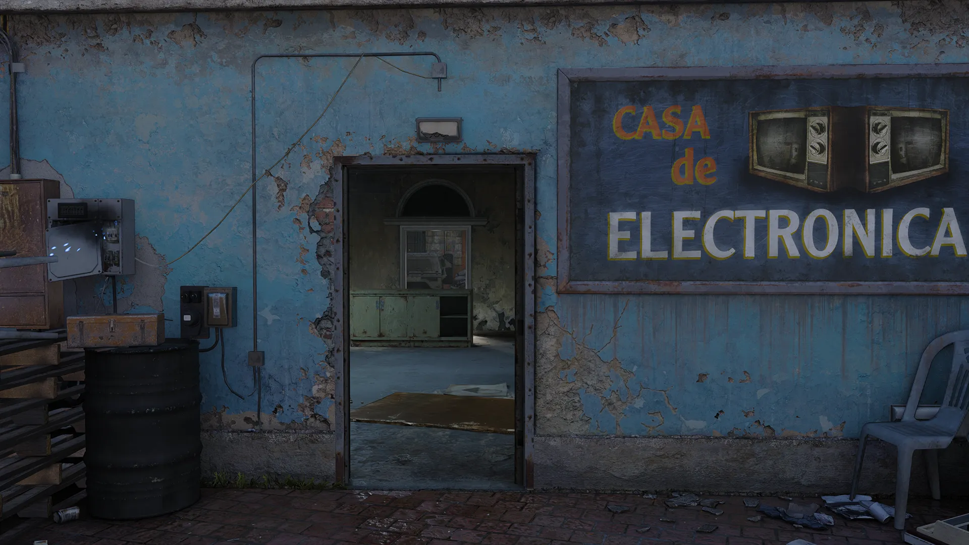 Exterior of a weathered electronics shop with peeling blue paint and Spanish signage.