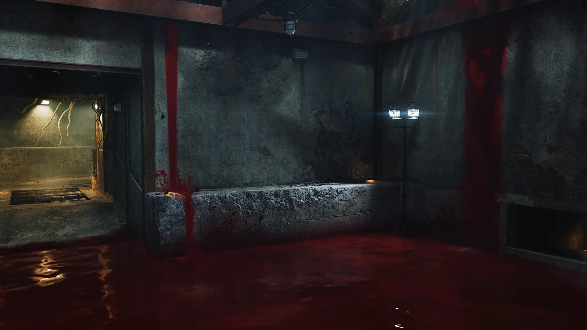 Interior concrete room partially flooded with red liquid and portable work lights.