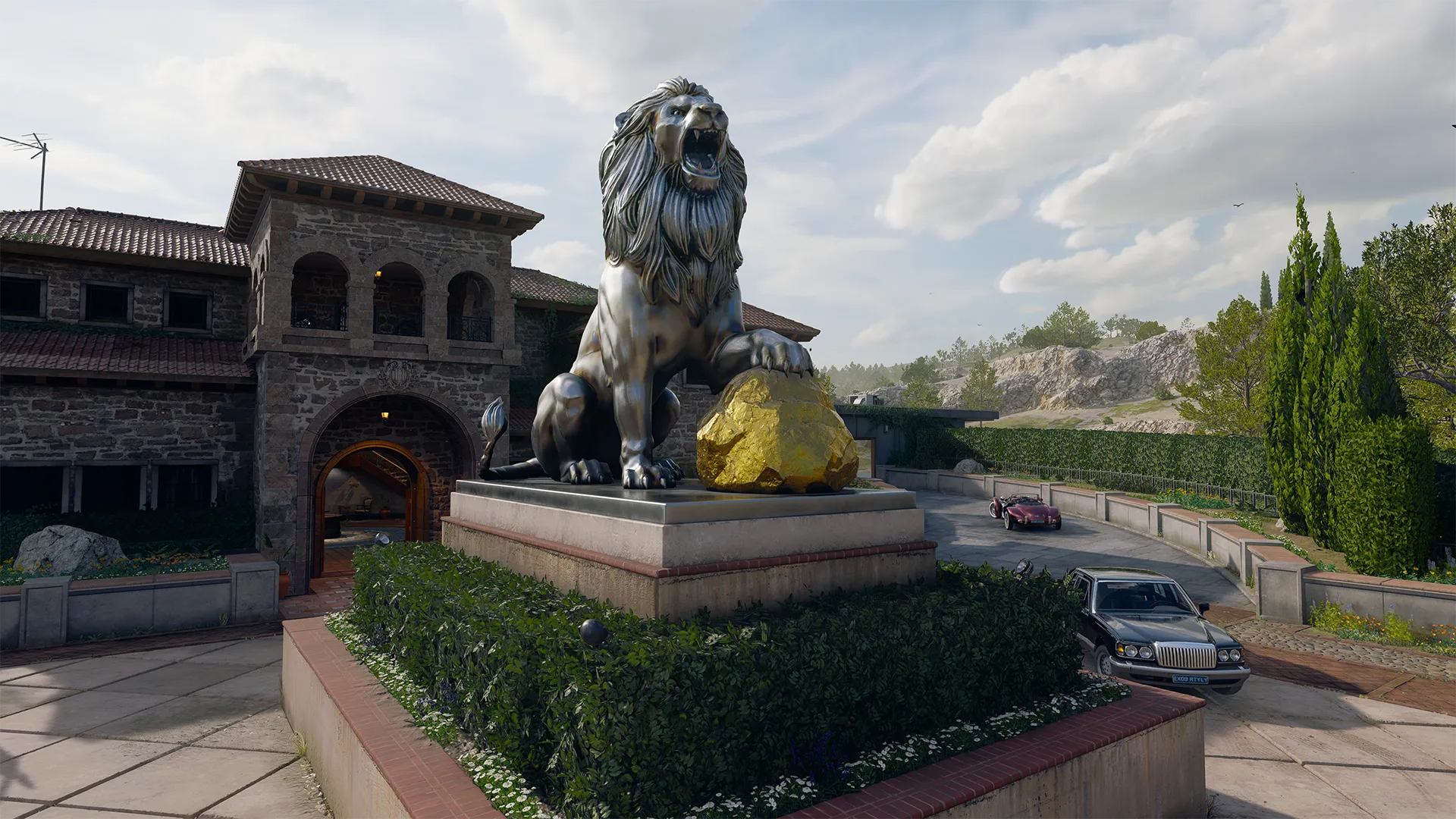 Large stone mansion courtyard with a roaring lion statue holding a gold rock, cars parked along the drive.