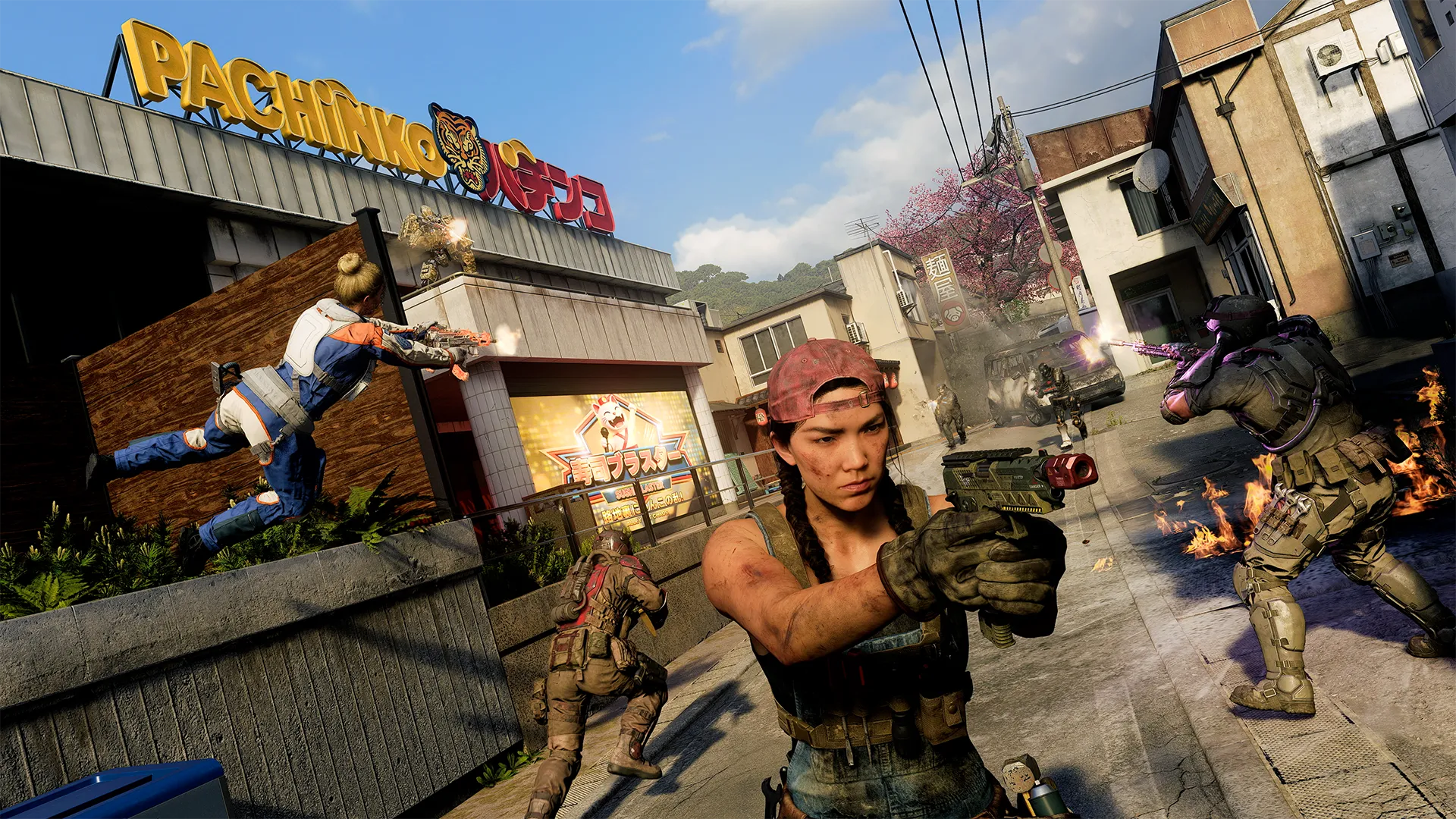 Operators exchange gunfire across the streets of the Jubilee map outside the Pachinko arcade as multiple firefights unfold.