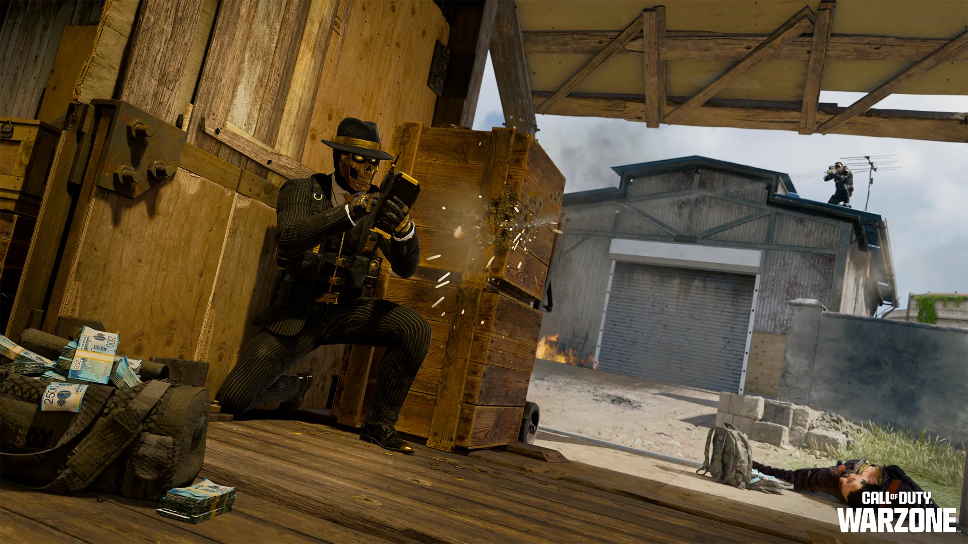 Masked fighter in a pinstripe suit takes cover behind crates during a firefight, with cash scattered nearby and enemies in the background.