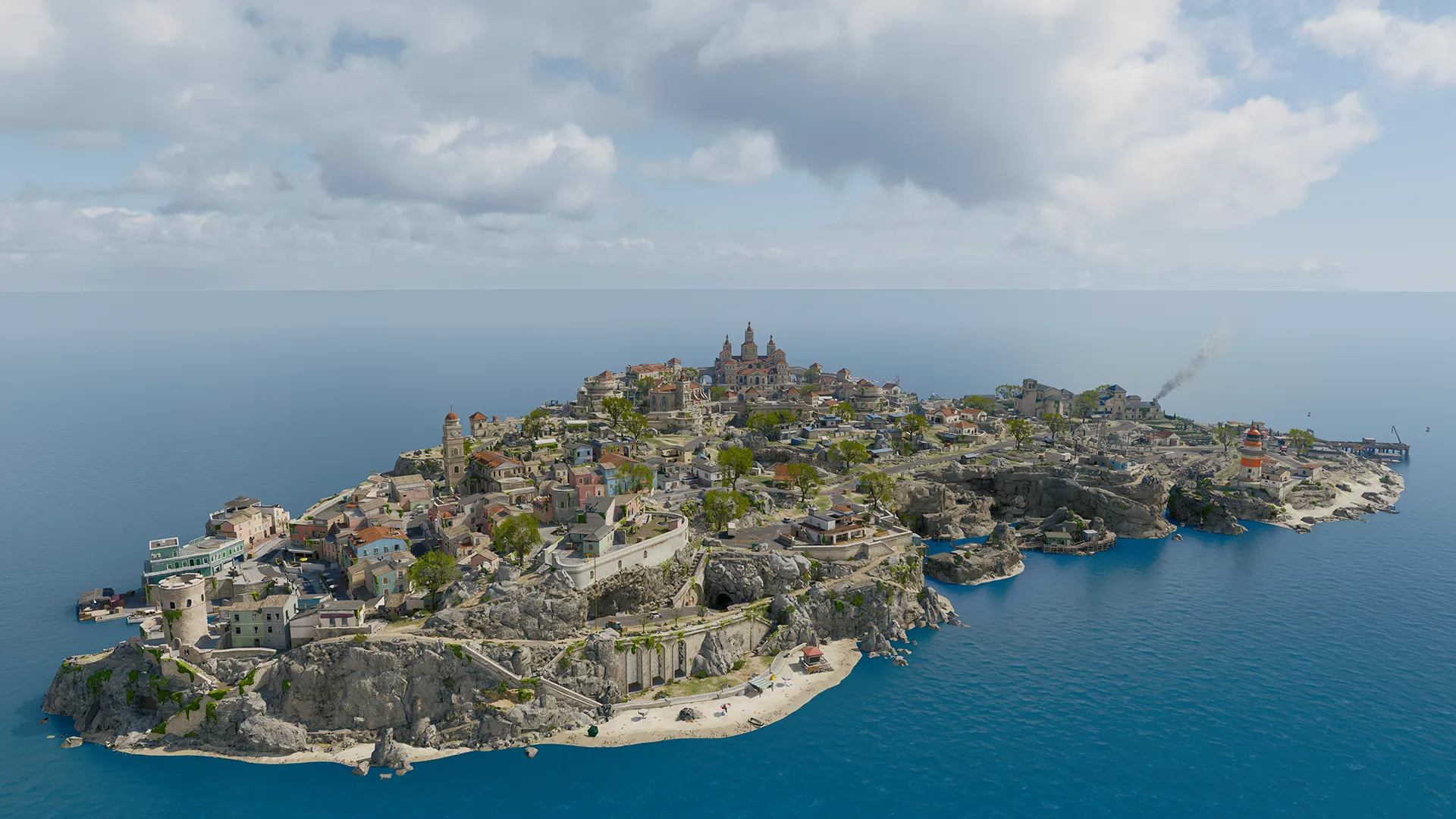 Aerial view of a rocky island town surrounded by bright blue ocean water.