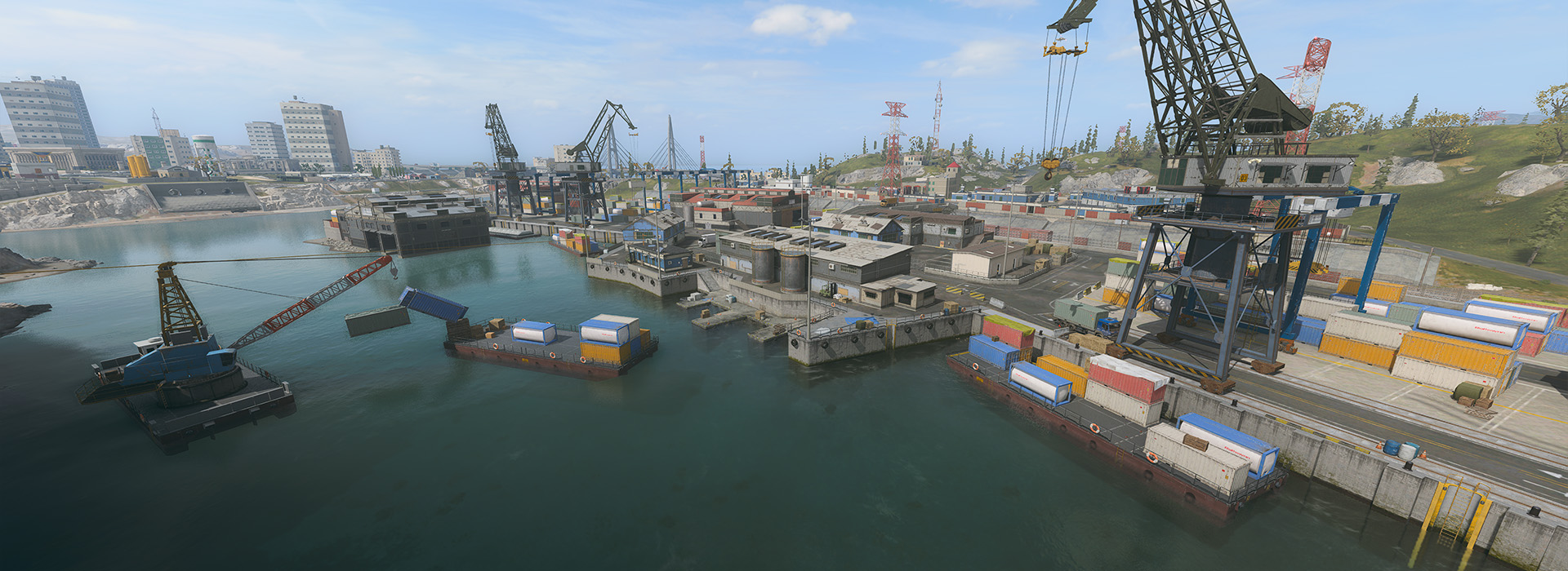 A cargo port is dotted with various shipping boats and containers as well as a large rusty crane.