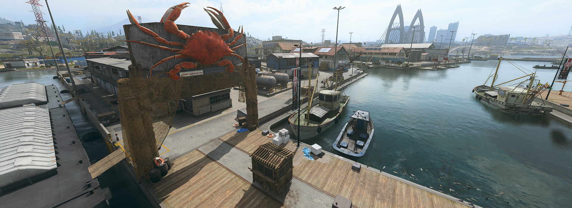 Seaport District docks with abandoned boats in the water. A fishery is in the upper half of the photo.