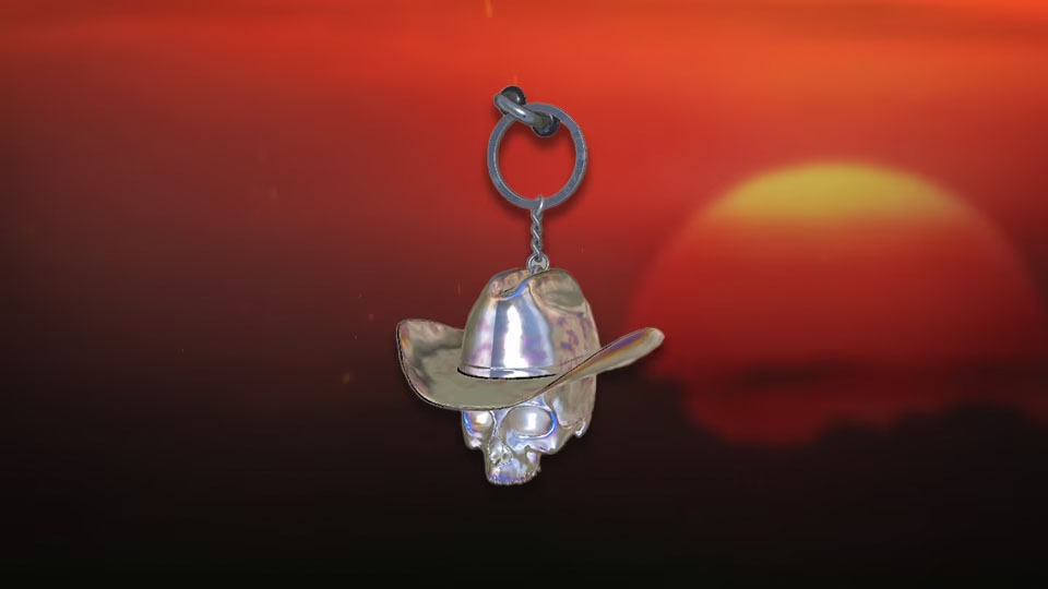 Weapon charm of a skull with a cowboy hat